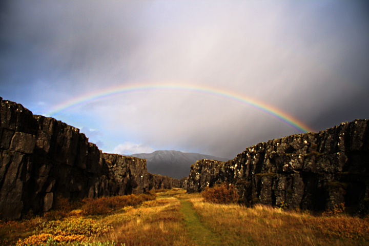 a rainbow connects the north american (l) and eurasian (r) continental plates, þingvellir (thingvellir)