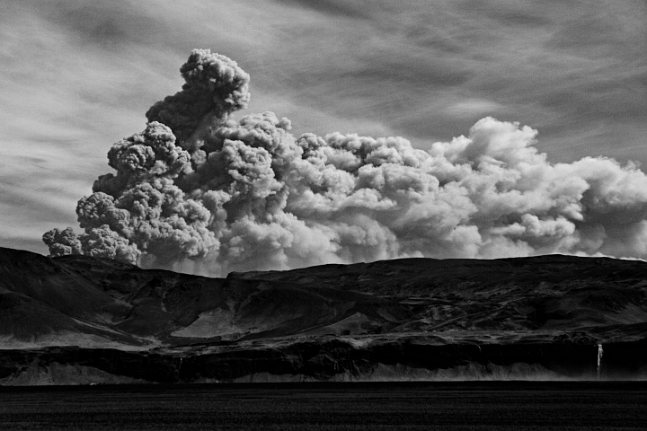 seljalandsfoss (right, 60 meters) and eyjafjallajökull volcano's ash cloud